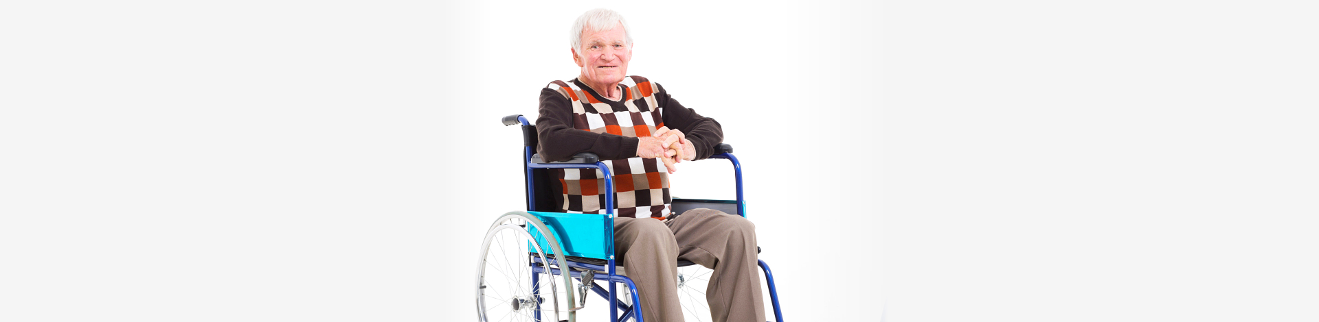 disabled senior man sitting in wheelchair